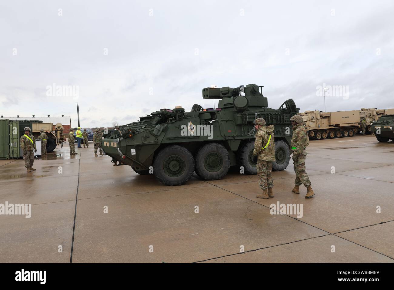 Soldiers from the 75th Field Artillery Brigade; the 2nd Battalion, 18th Field Artillery Regiment; and the 4th Battalion, 60th Air Defense Artillery Regiment load various military vehicles onto rails in preparation for an Emergency Deployment Readiness Exercise (EDRE) at the National Training Center (NTC). Stock Photo