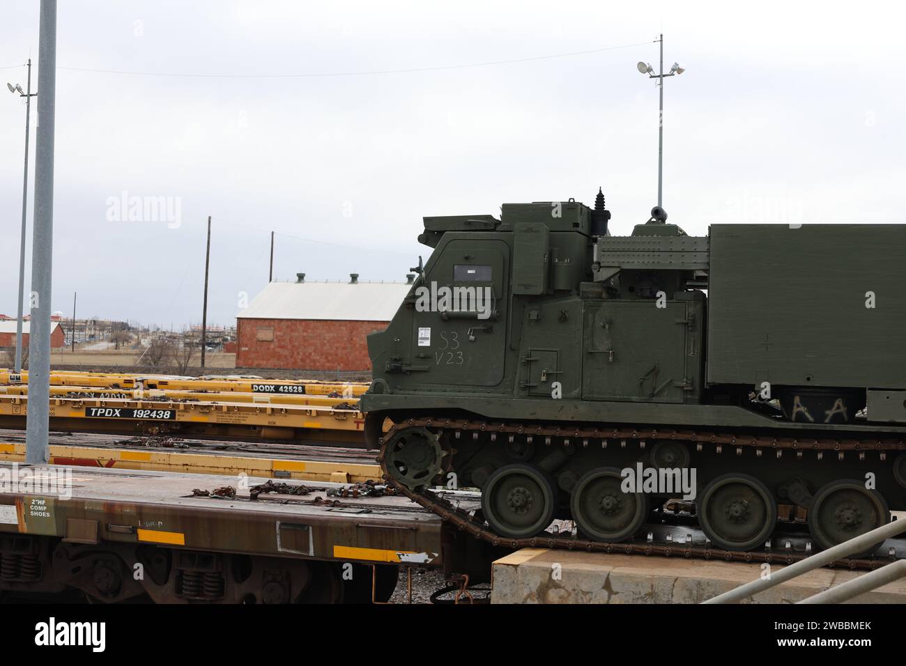 Soldiers from the 75th Field Artillery Brigade; the 2nd Battalion, 18th Field Artillery Regiment; and the 4th Battalion, 60th Air Defense Artillery Regiment load various military vehicles onto rails in preparation for an Emergency Deployment Readiness Exercise (EDRE) at the National Training Center (NTC). Stock Photo