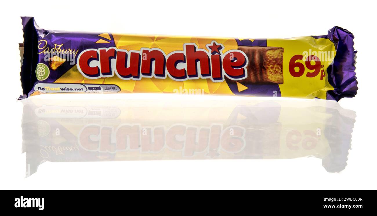 Winneconne, WI - 9 January 2024: A package of Cadbury crunchie candy bar on an isolated background. Stock Photo