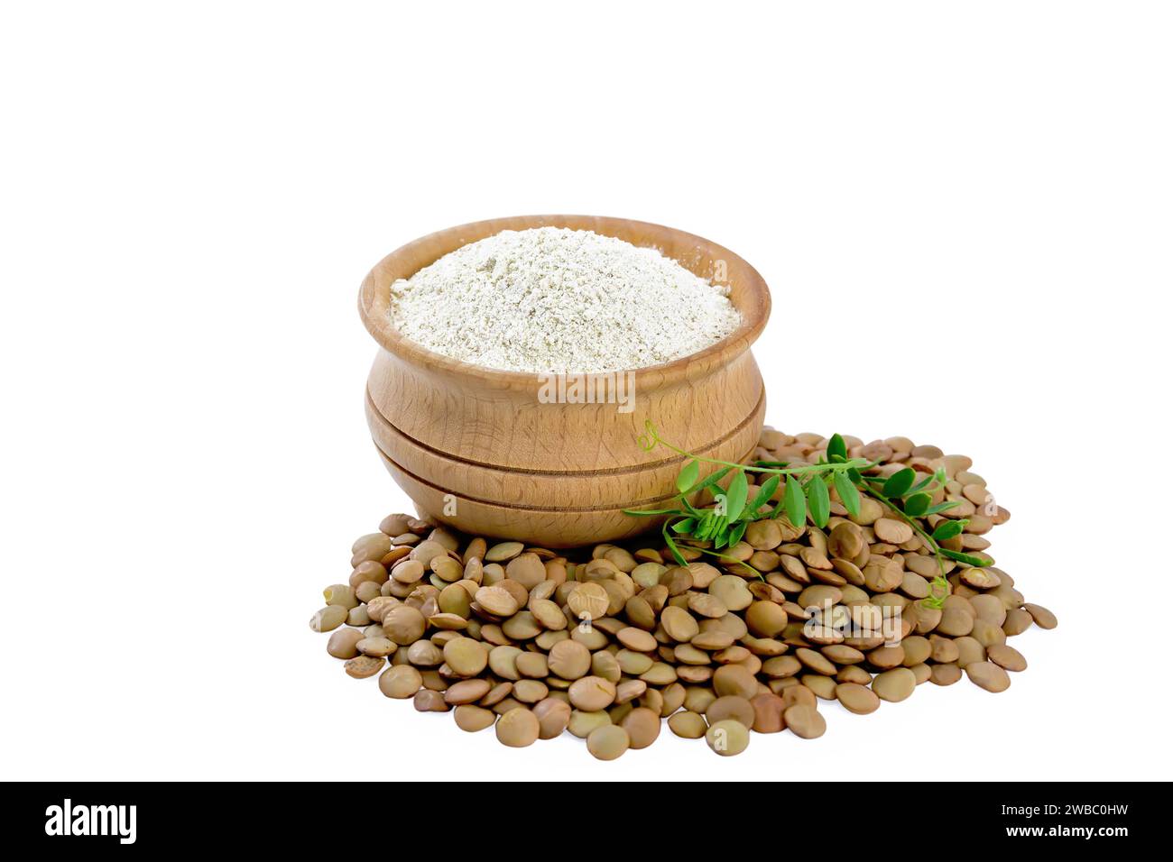 Lentil flour in bowl, stalk with lentil leaves and legume isolated on white background Stock Photo