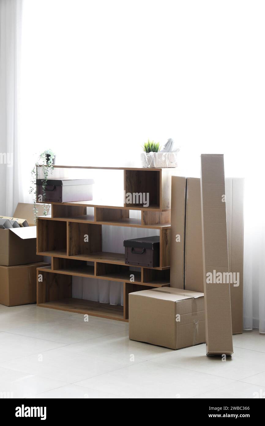 Shelving unit cardboard boxes hi-res stock photography and images - Alamy