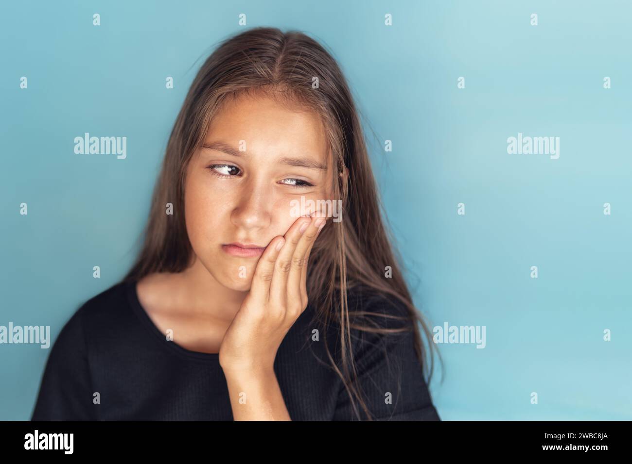 Tooth Sensitivity Concept. Unhappy girl suffering from toothache