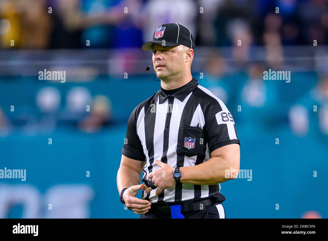 NFL umpire Mike Morton stands on the field during an NFL football game ...