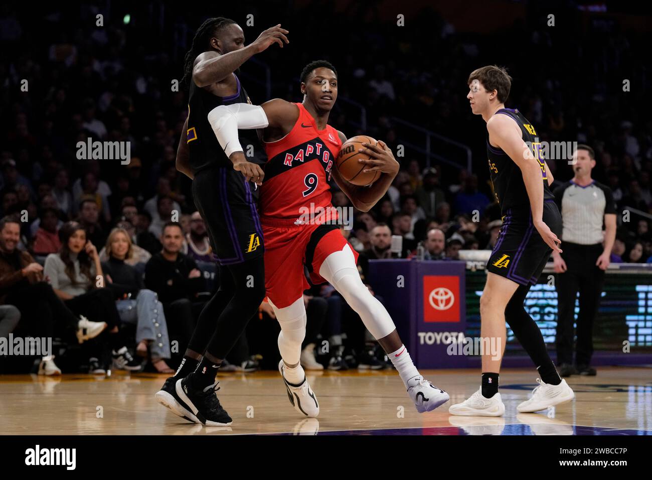 Los Angeles Lakers forward Taurean Prince (12) fouls Toronto Raptors ...