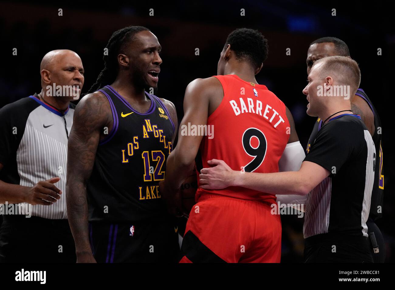 Los Angeles Lakers forward Taurean Prince (12) and Toronto Raptors ...