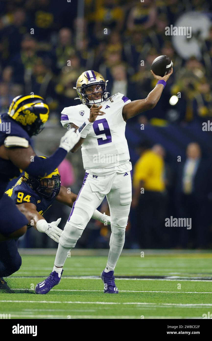 HOUSTON, TX - JANUARY 08: Washington Huskies quarterback Michael Penix Jr. (9) passes the ball during the CFP National Championship against the Michigan Wolverines on January 08, 2024 at NRG Stadium in Houston, Texas. (Photo by Joe Robbins/Image of Sport) Stock Photo