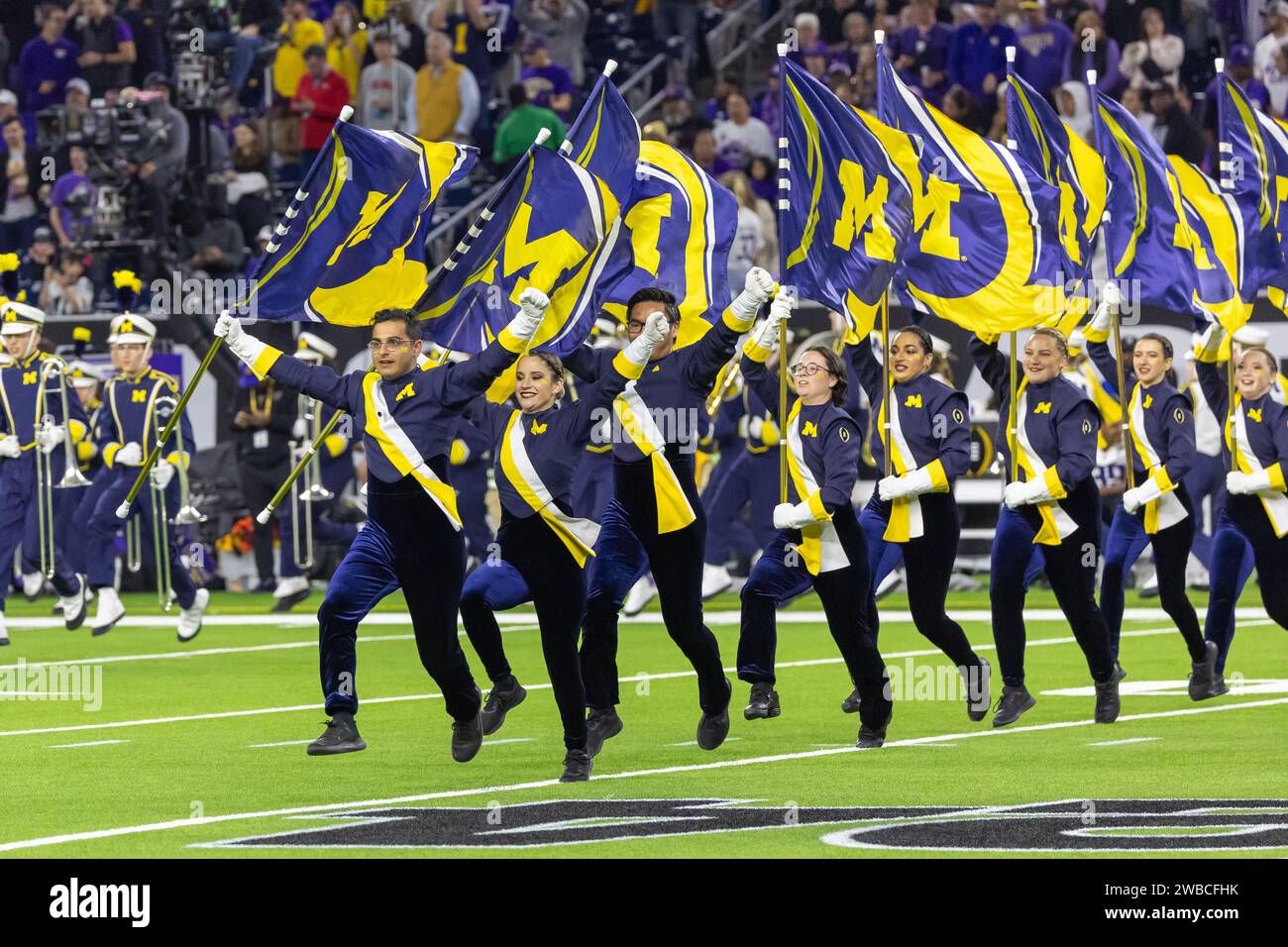 The Michigan Wolverines color guard takes the field for pregame during the 2024 College Football Playoff National Championship game, Monday, Feb. 20, Stock Photo