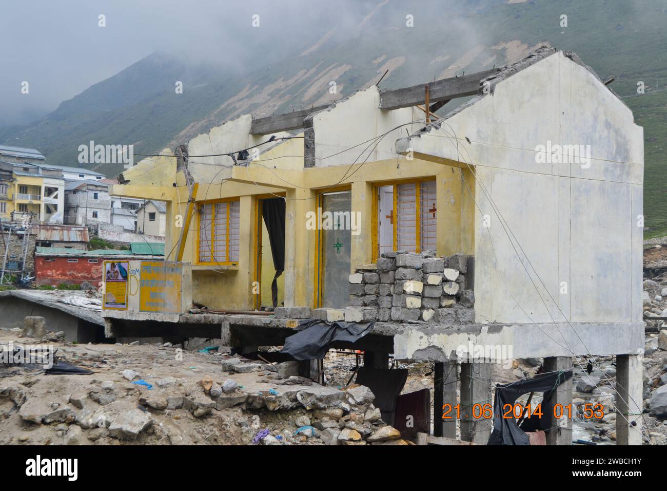 Damaged buildings in Kedarnath disaster June 2013. In June 2013, a multi-day cloudburst centered on the North Indian state of Uttarakhand caused devas Stock Photo