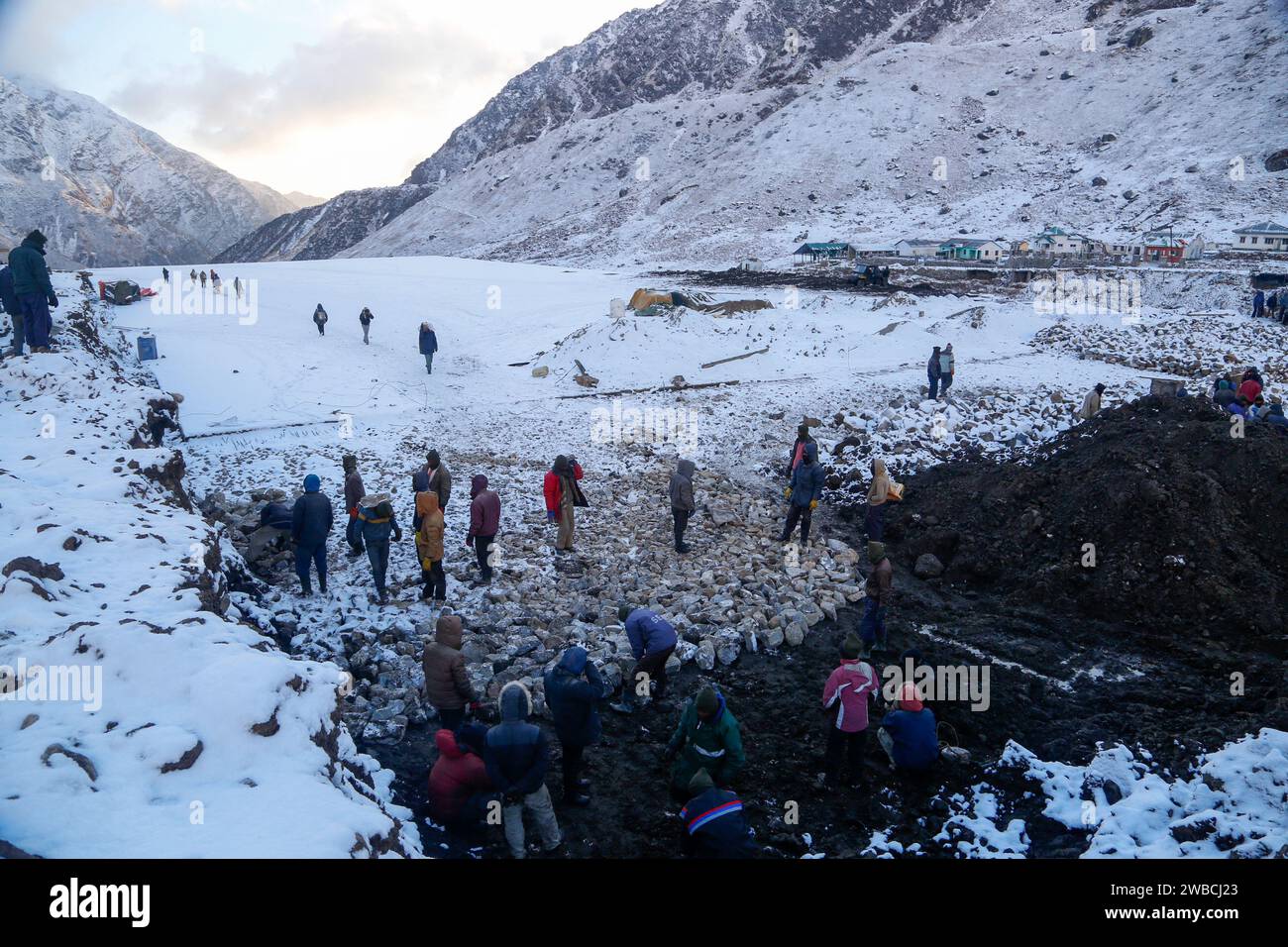 Rudraprayag, Uttarakhand, India, December 12 2014, Kedarnath reconstruction after disaster in extreme winter and snowfall. Government made a reconstruction plan for the Kedarnath temple area that was damaged in floods of 2013. Stock Photo