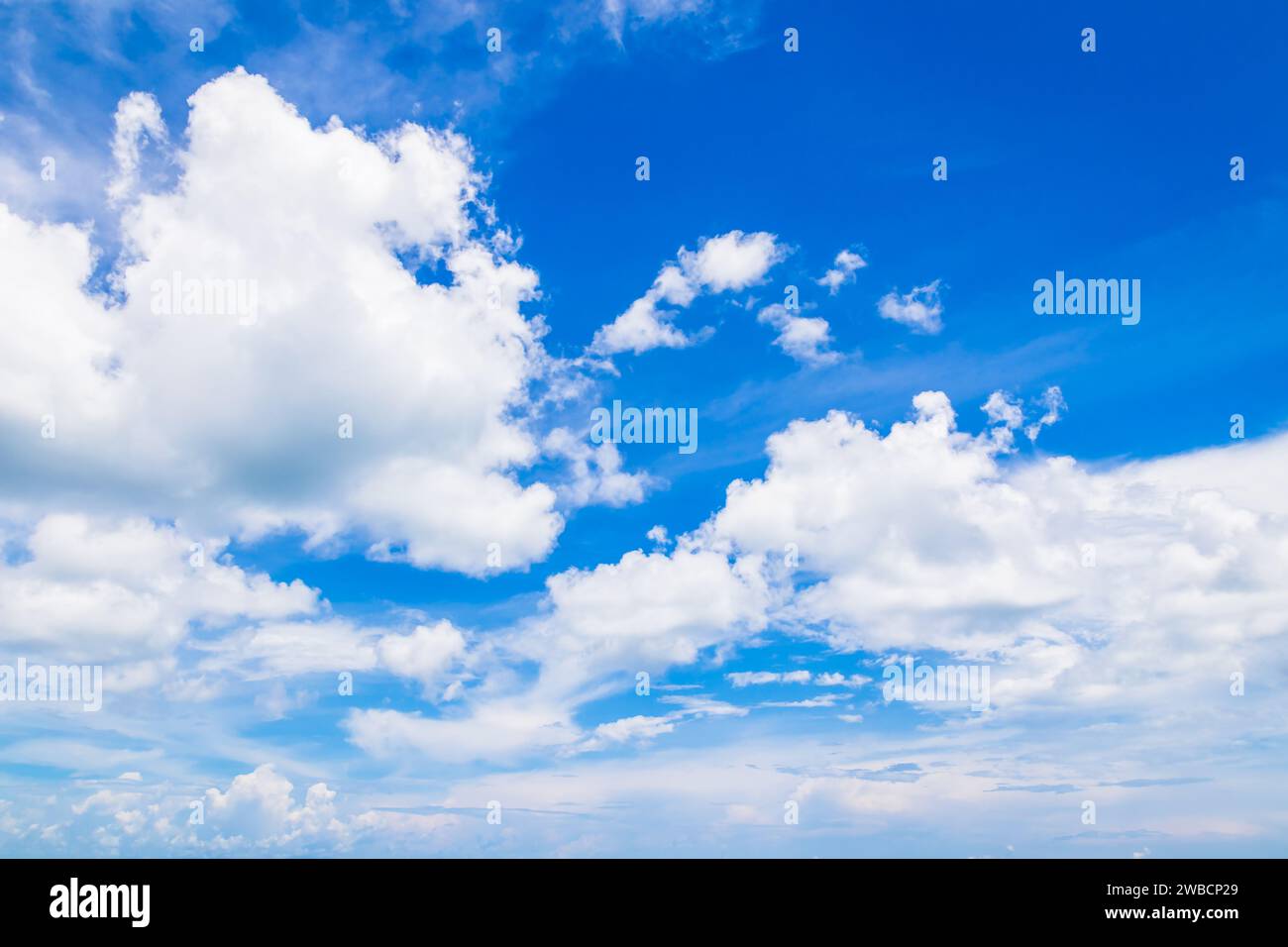 Beautiful white fluffy cloud on blue sky background. Stock Photo