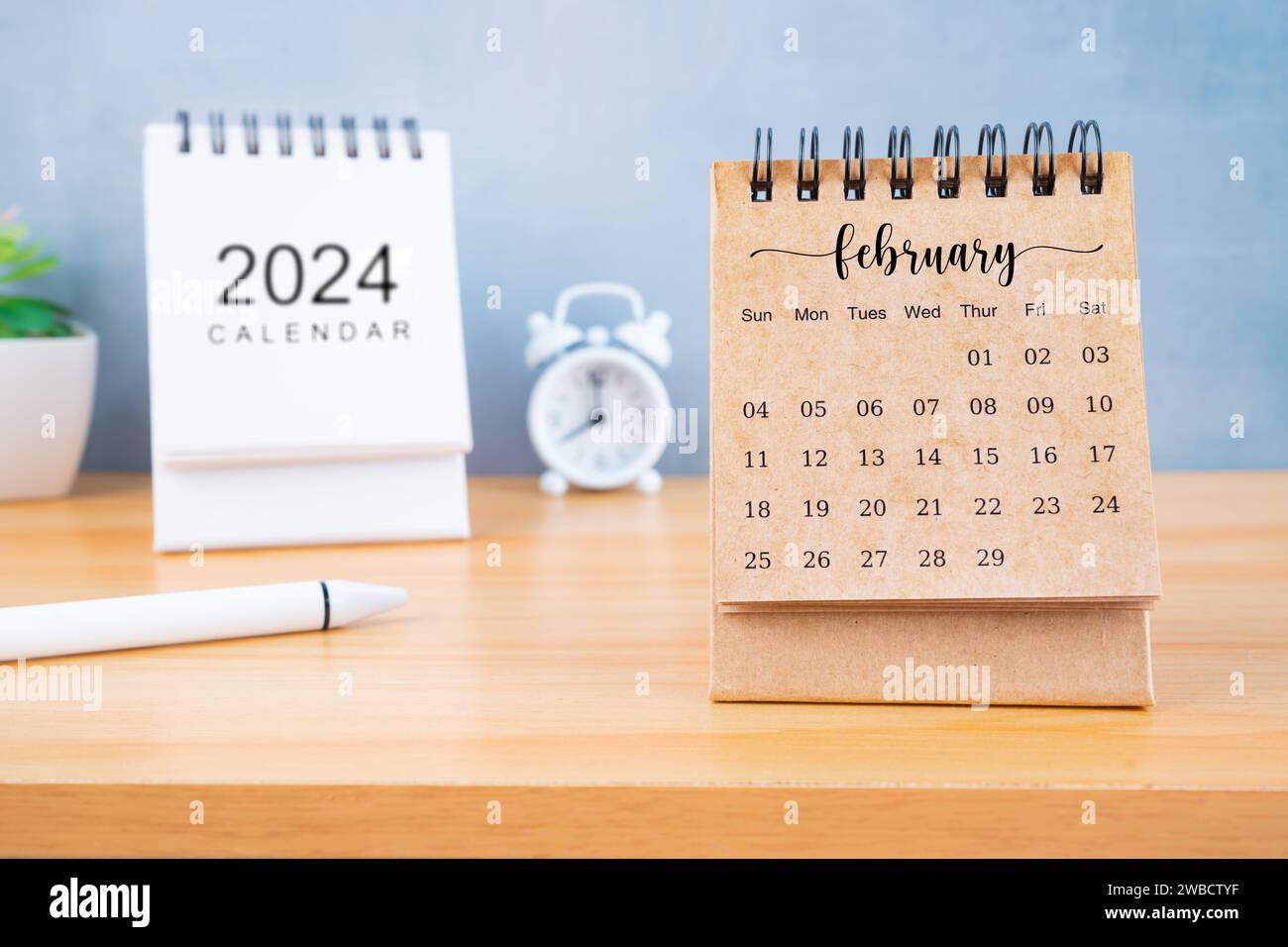Front view of February desk calendar for 2024 year with pen on ...