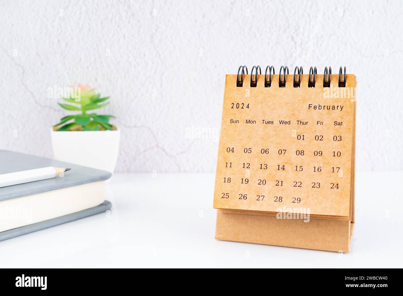 February 2024, Monthly desk calendar for 2024 year on the table with ...