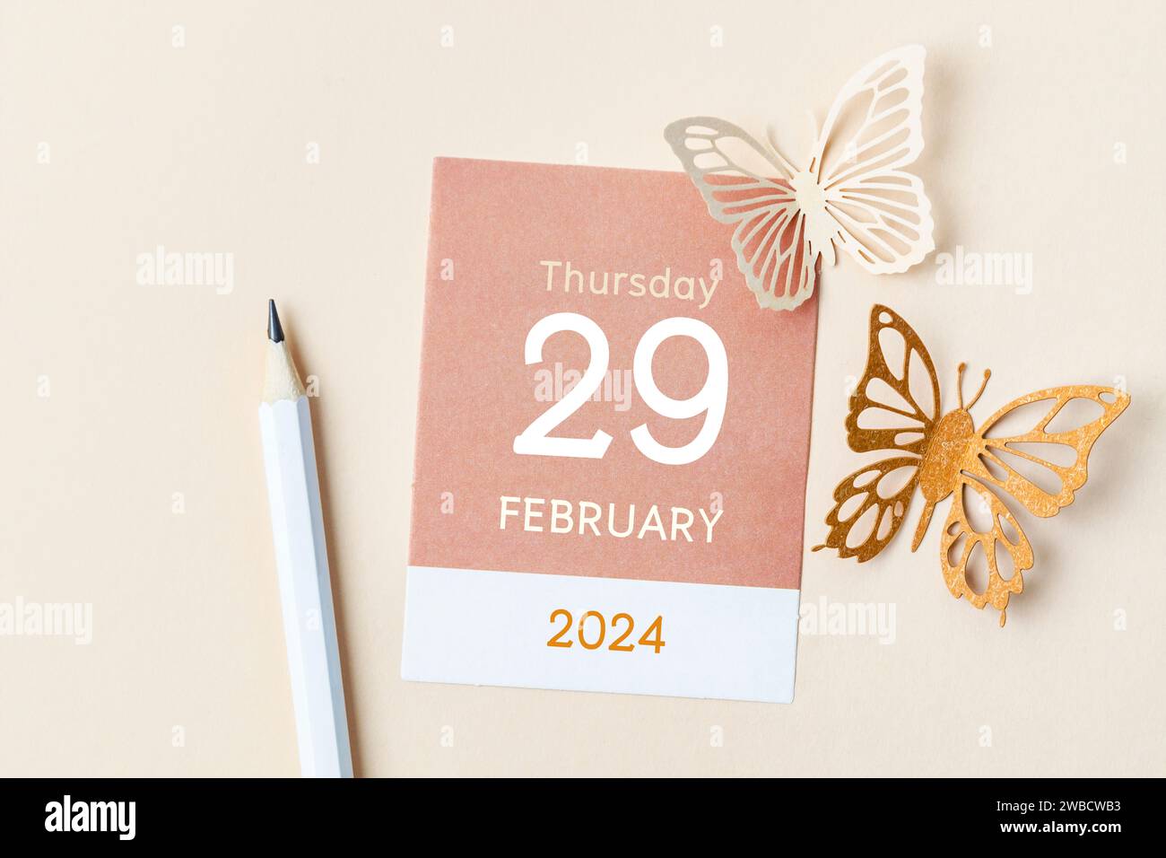 February 29th mini calendar for February 2024 and butterfly paper on