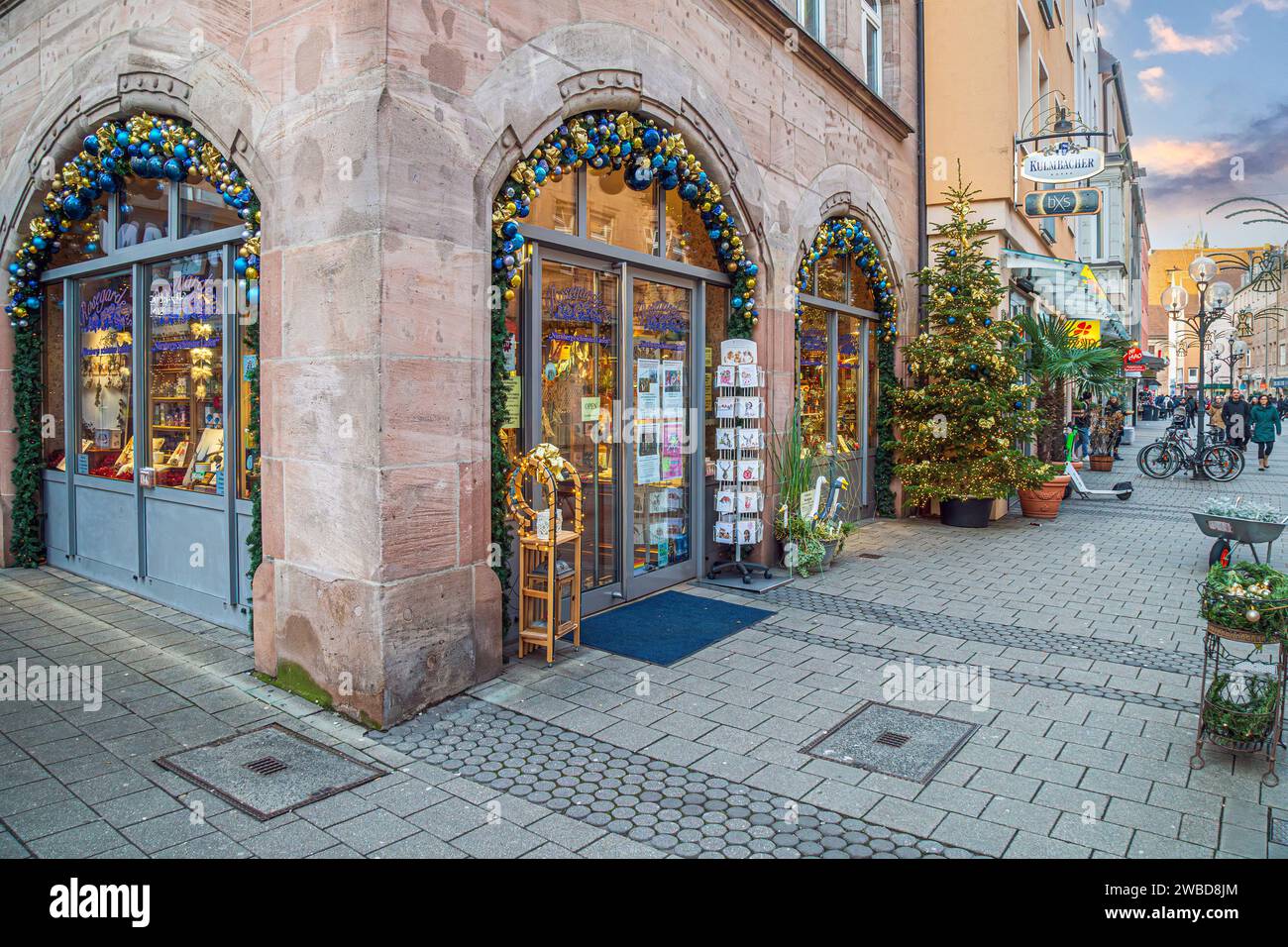 NUREMBERG, BAVARIA, GERMANY - DECEMBER 16, 2023: Beautiful Christmas decorations at a shop in the old town. Stock Photo