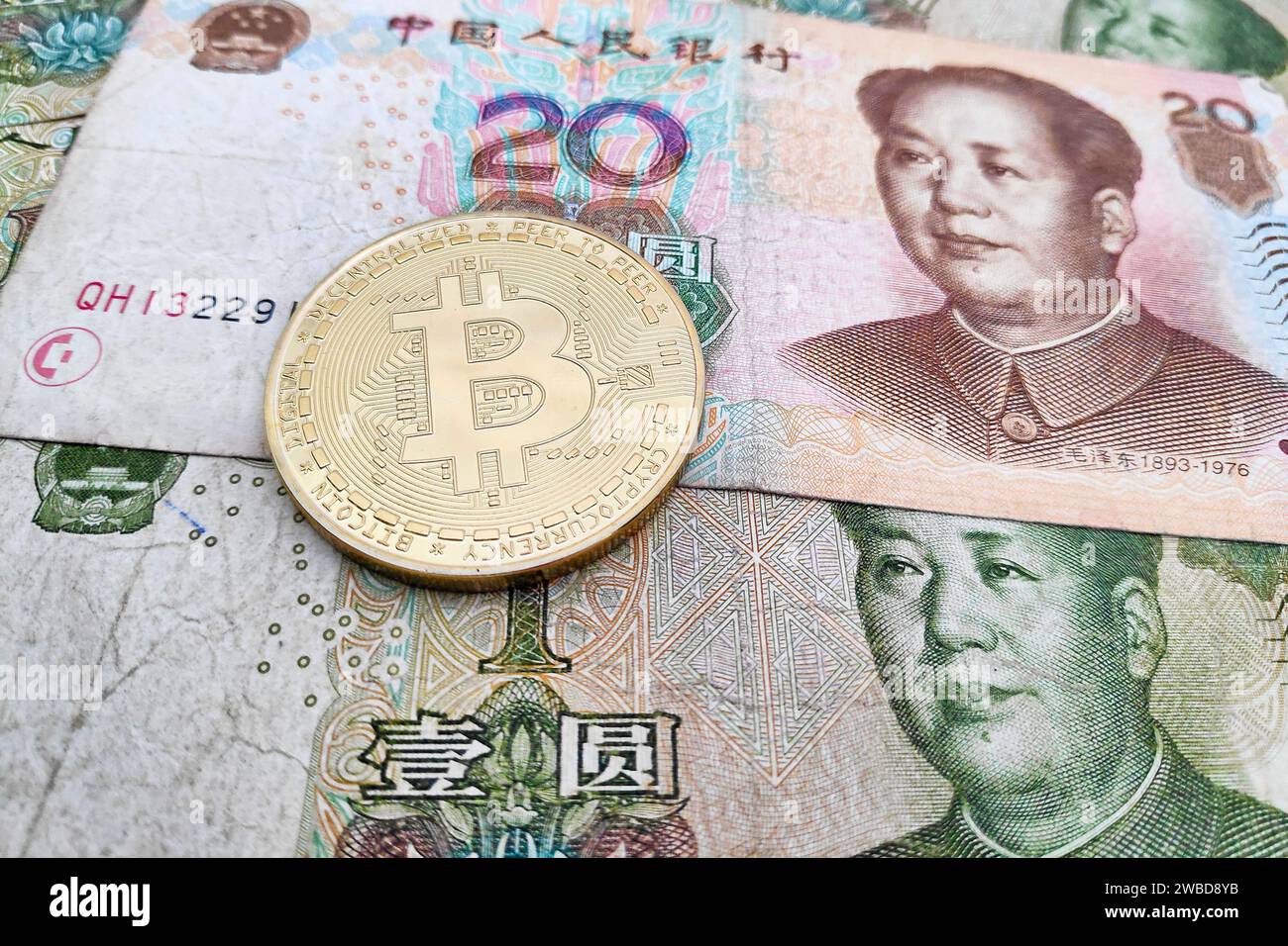 bitcoin with chinese yuan renminbi banknotes Stock Photo - Alamy