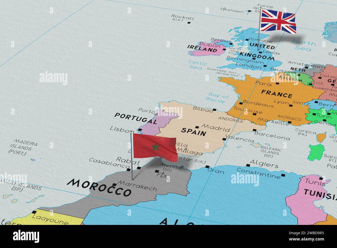 United Kingdom and Morocco pin flags on political map 3D