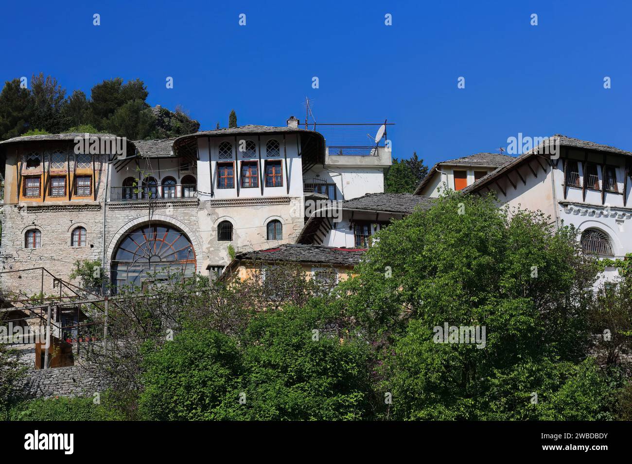 214 Ottoman-style dwellings made of stone on the slope down the hill facing the citadel from the west. Gjirokaster-Albania. Stock Photo