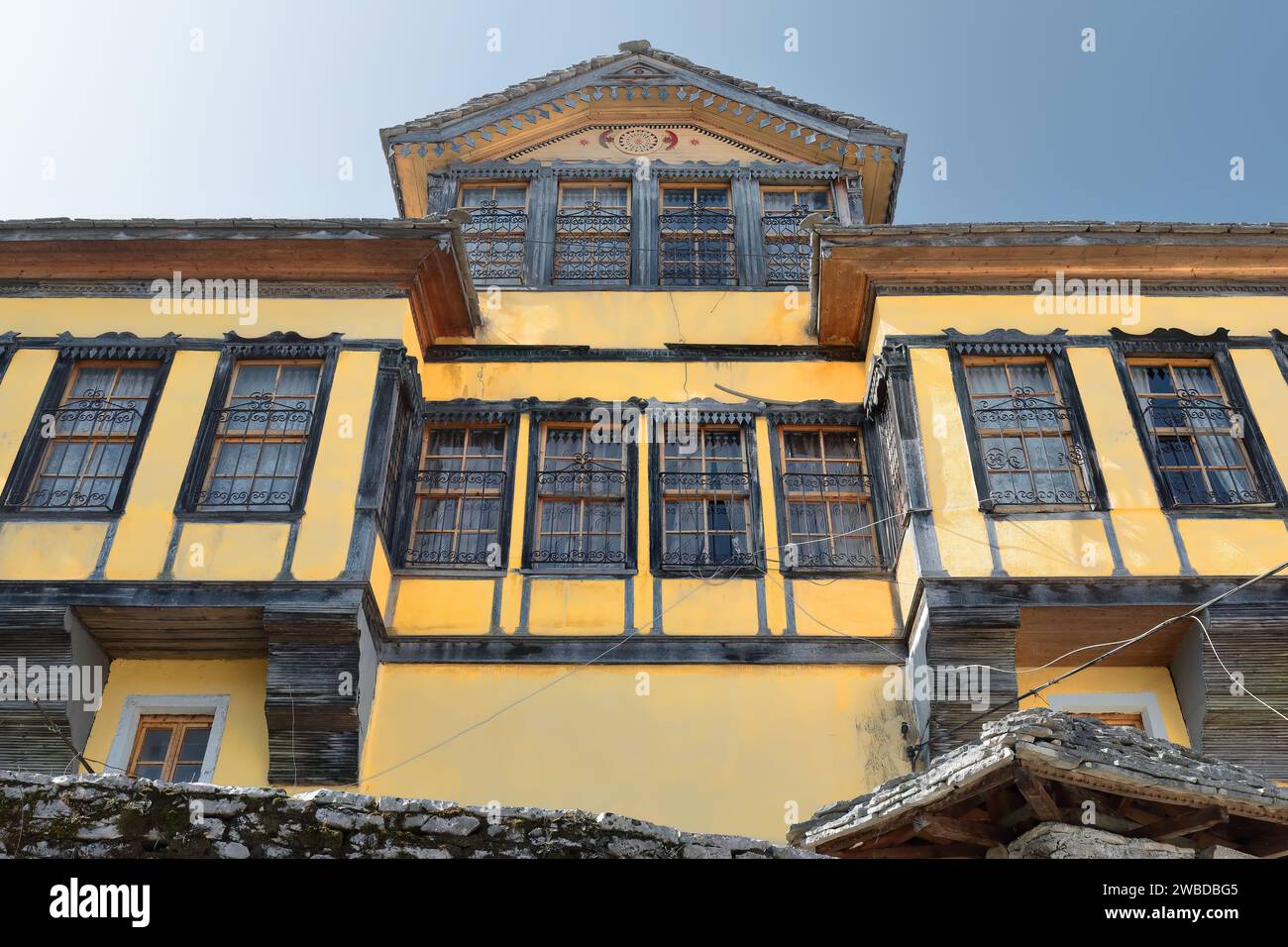 225+ Attic of Ottoman-style house full of iron-barred windows and profuse wood decoration, old town-Palorto district. Gjirokaster-Albania. Stock Photo