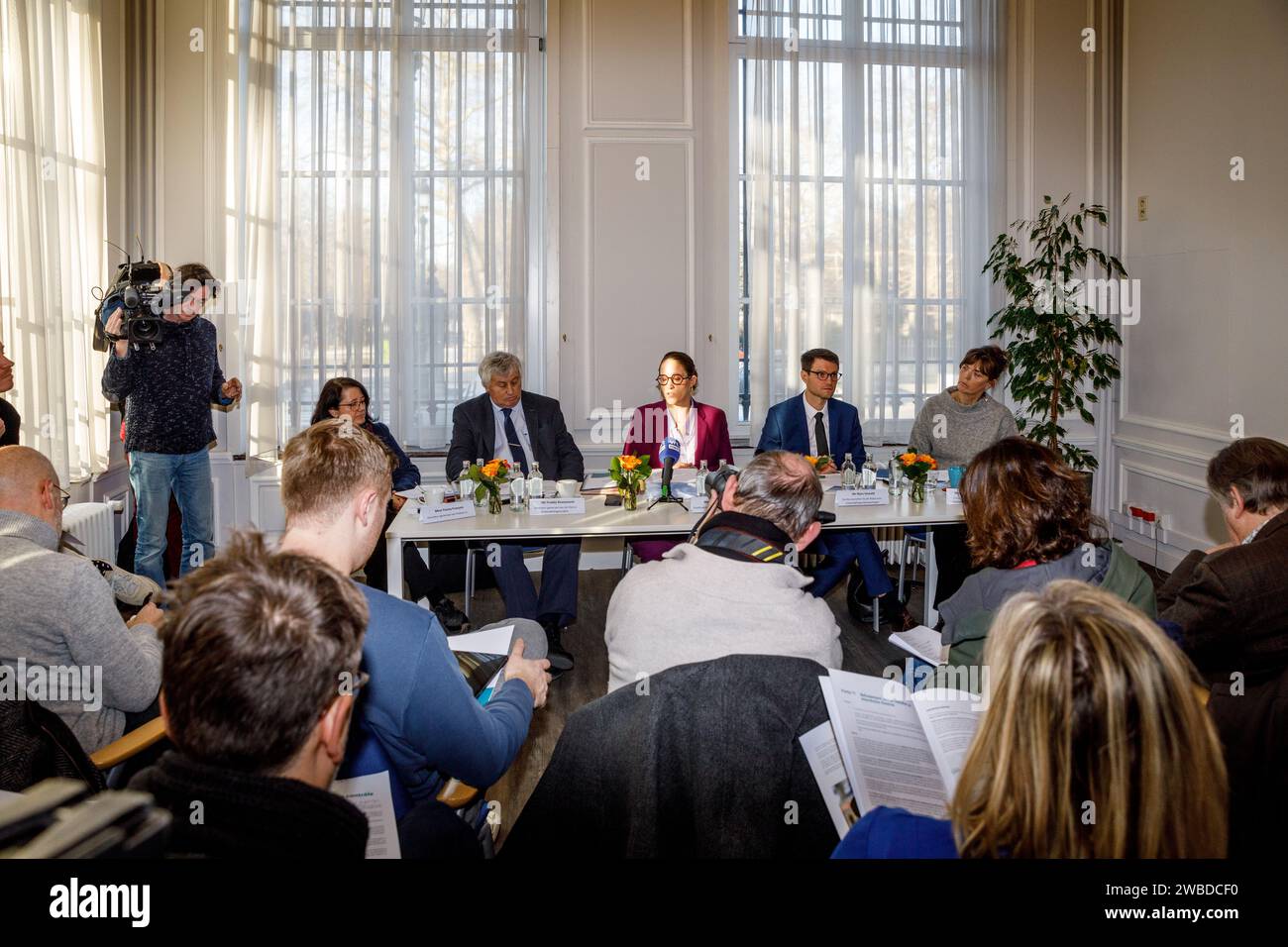 Brussels, Belgium. 10th Jan, 2024. Fanny Francois, Freddy Roosemont, State Secretary for Asylum and Migration policy Nicole de Moor, Marc Oswald and Sophie van Valberghe pictured during the presentation of the new controlled migration code (wetboek - code de migration), in Brussels, Wednesday 10 January 2024. The new controlled migration law has been assembled by State Secretary Nicole de Moor, in collaboration with the asylum and migration services BELGA PHOTO HATIM KAGHAT Credit: Belga News Agency/Alamy Live News Stock Photo