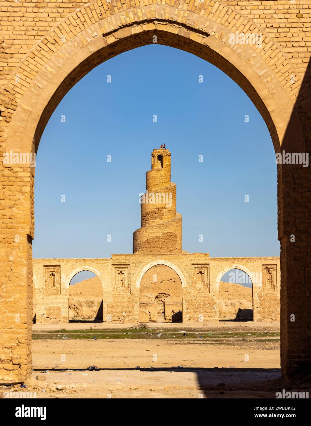 father and child, Iraqi tourists, on top of the minaret of the 9th century Abbasid Abu Dulaf Mosque, Samarra, Iraq Stock Photo