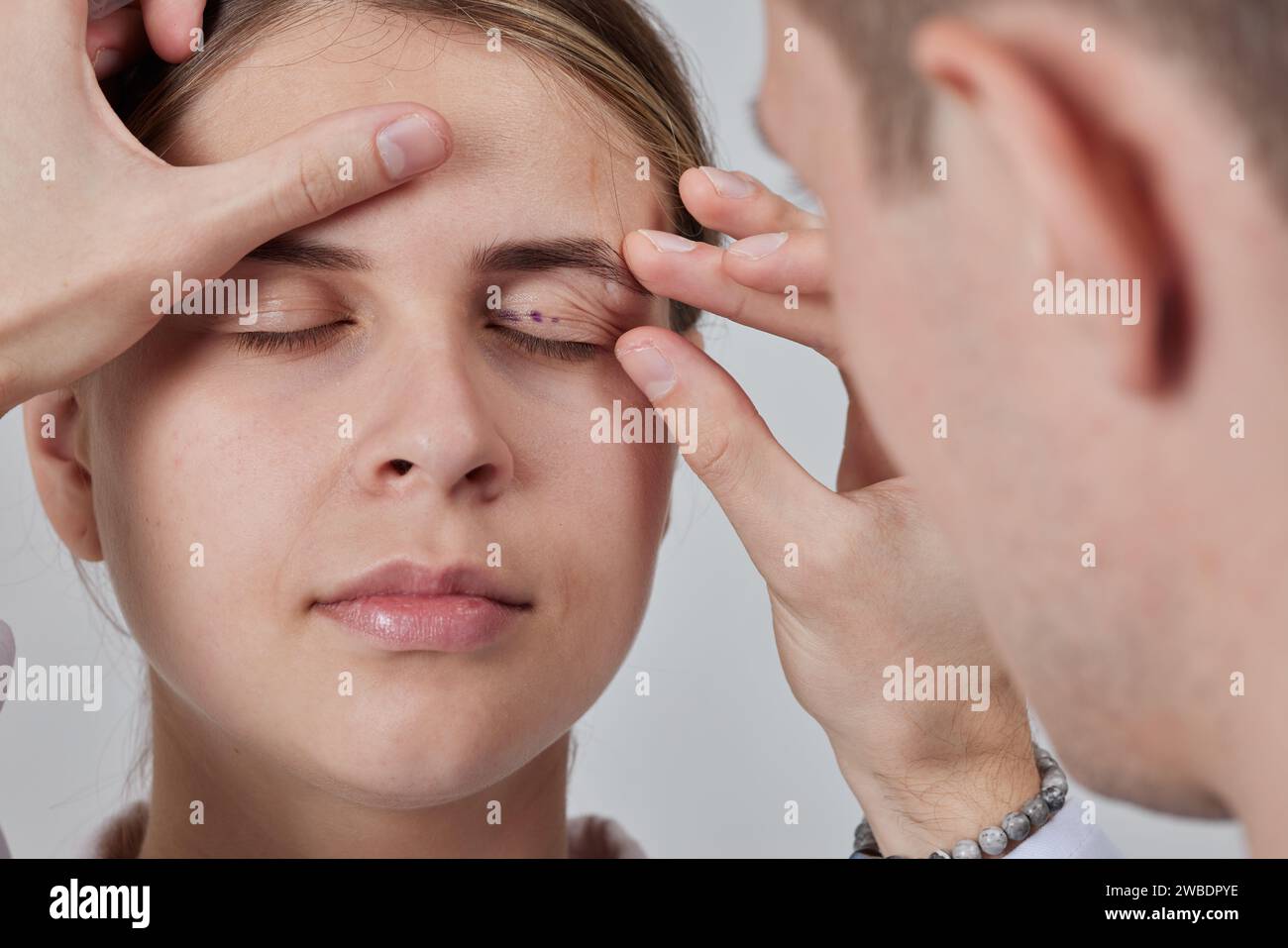 plastic surgeon prepares for Blepharoplasty, Blepharoplasty operation