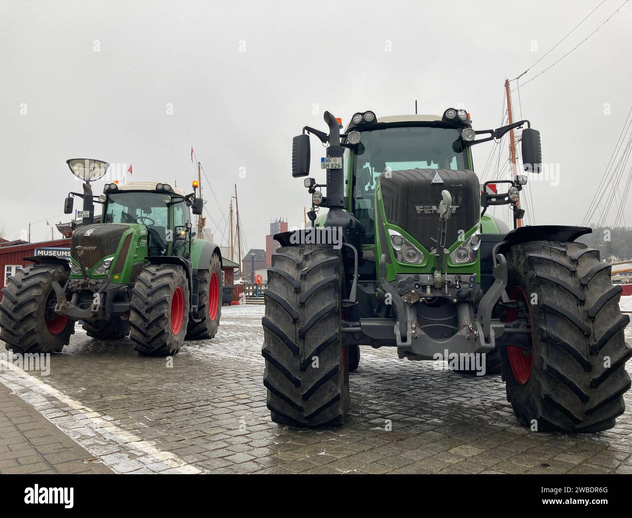 Flensburg, Germany. 10th Jan, 2024. Two tractors are parked at the