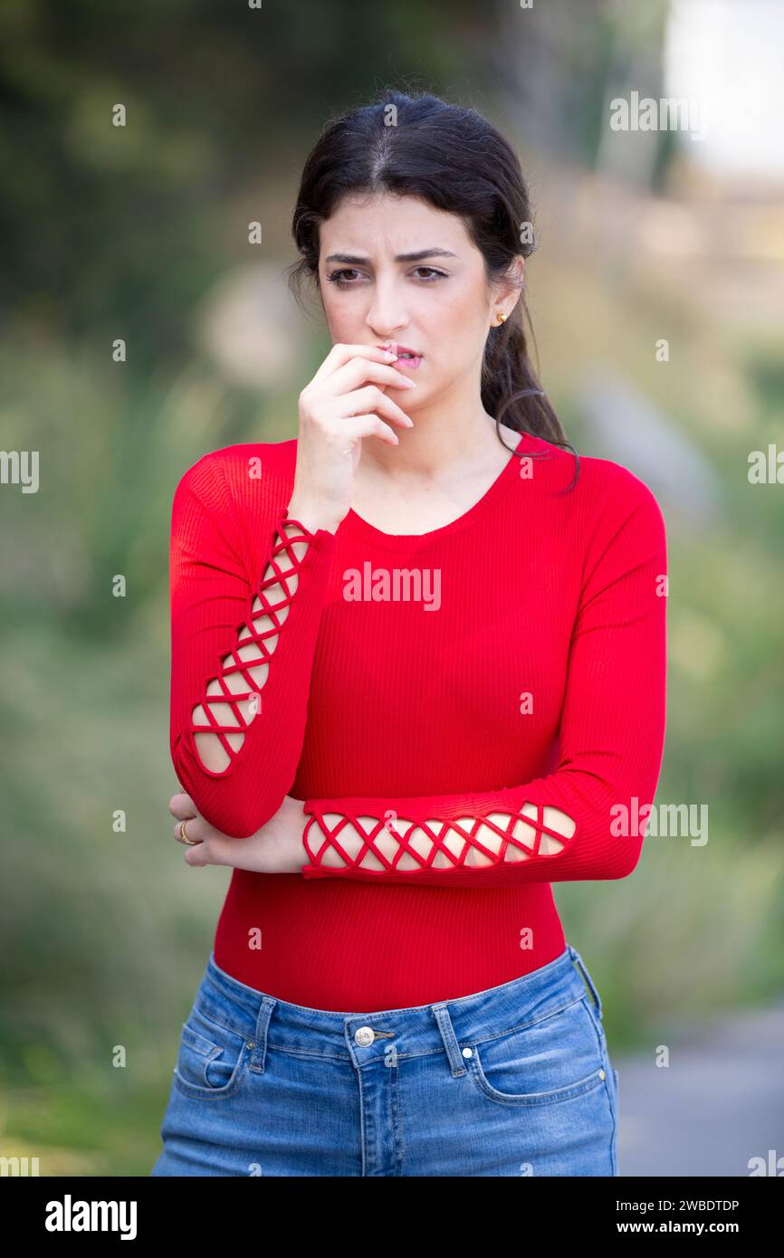 Stressed woman outdoors Stock Photo - Alamy