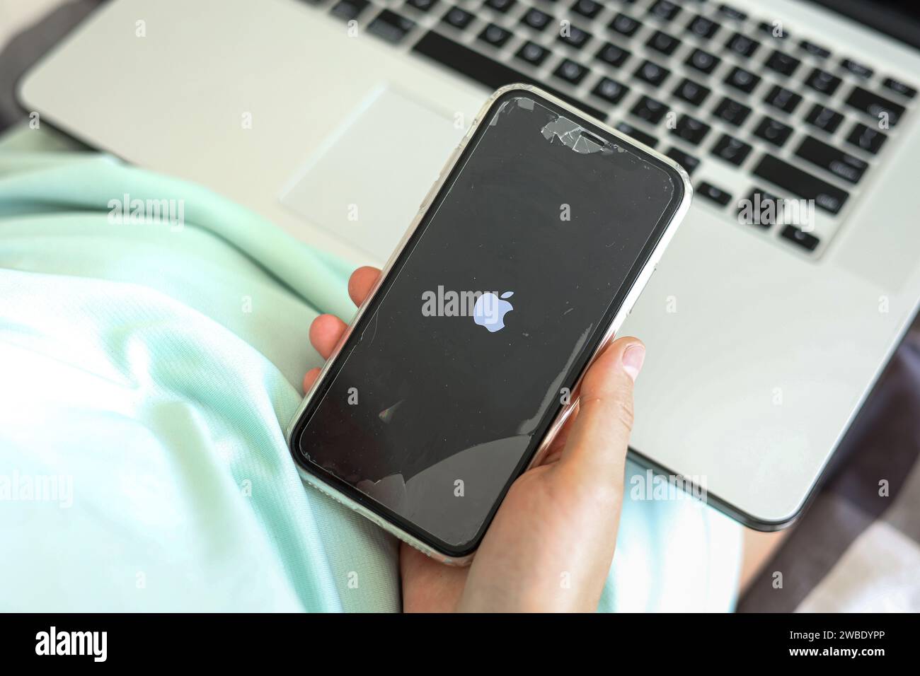 Hand holds smartphone smashed hi-res stock photography and images - Alamy