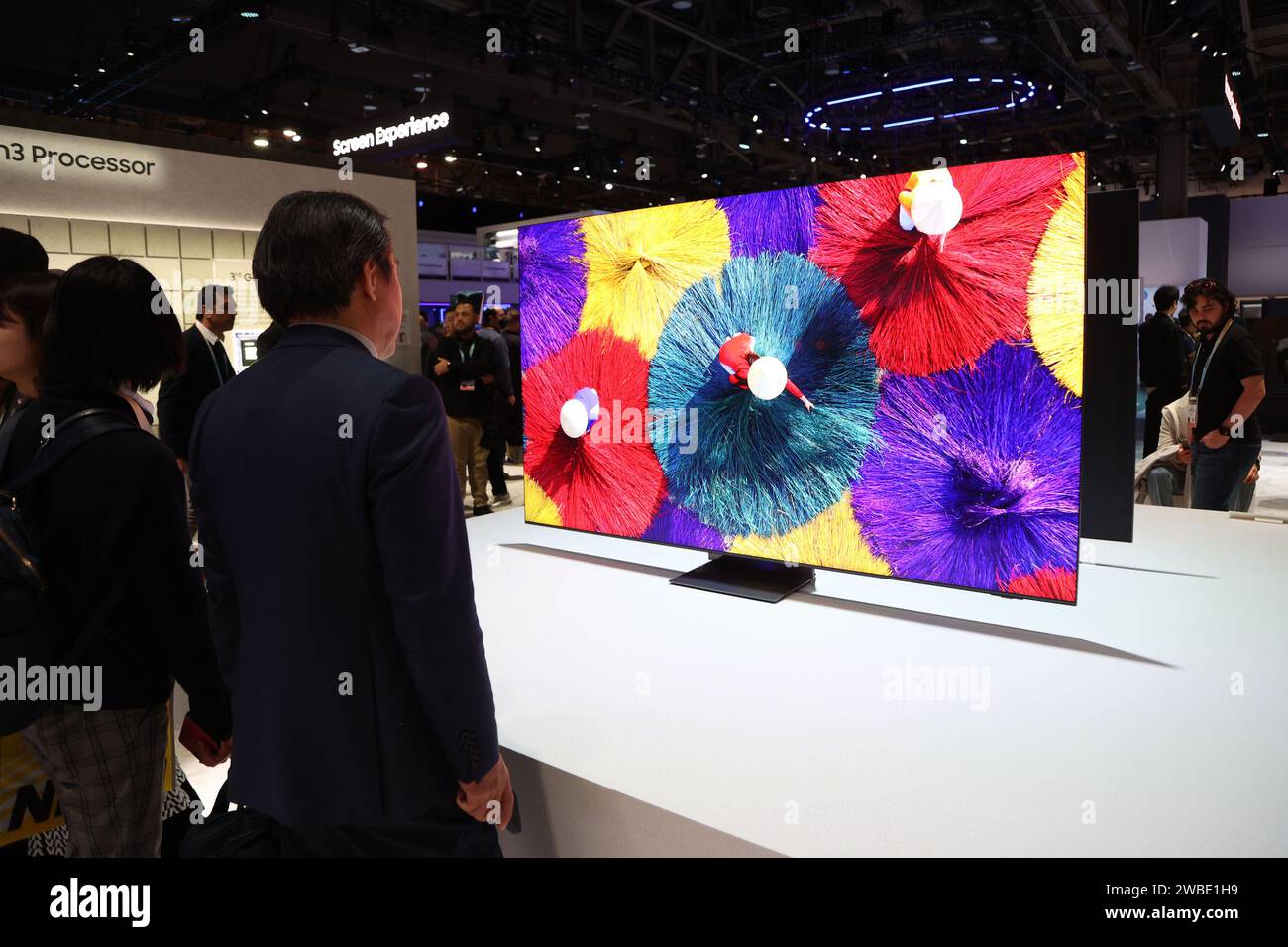 Las Vegas, United States. 09th Jan, 2024. An attendee views a demonstration of a Samsung 8K compatible LED TV, during the 2024 International CES, at the Las Vegas Convention Center in Las Vegas, Nevada on Tuesday, January 9, 2024. Photo by James Atoa/UPI Credit: UPI/Alamy Live News Stock Photo