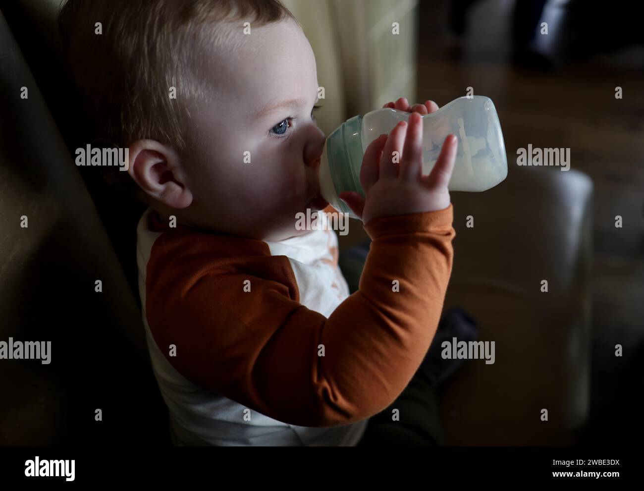 London, UK. 05th Jan, 2024. Image © Licensed to Parsons Media. 10/01/2024. London, United Kingdom. Aptamil Formula Milk Price Reduced. Alwyn Mills 10 Months drinks Aptamil as Danone will reduce the price it sells Aptamil baby formula to retailers by up to 7% from Monday - after manufacturers were criticised for 'exploiting' British families. Picture by Credit: andrew parsons/Alamy Live News Stock Photo