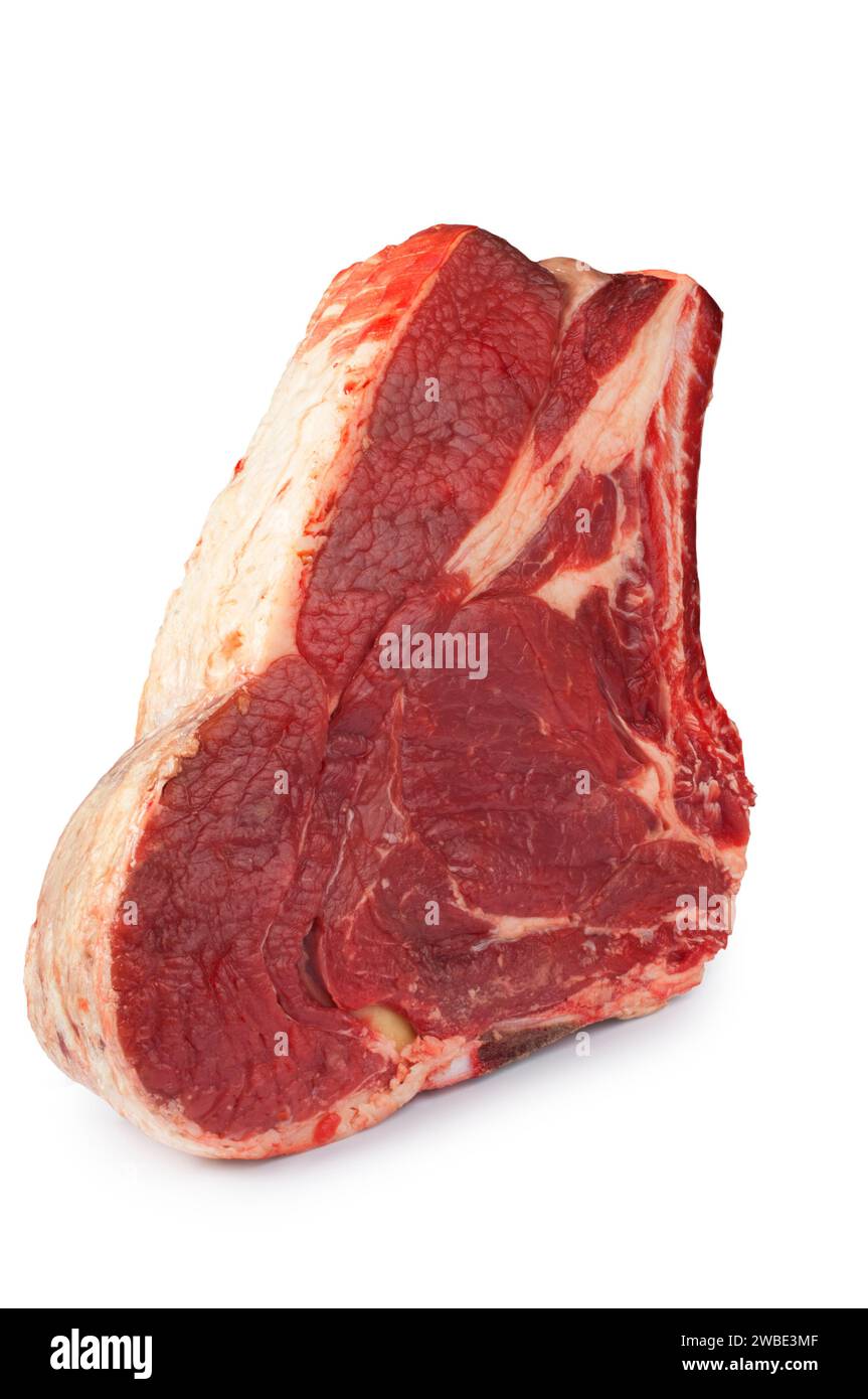 Studio shot of a rib of beef cut out against a white background - John Gollop Stock Photo
