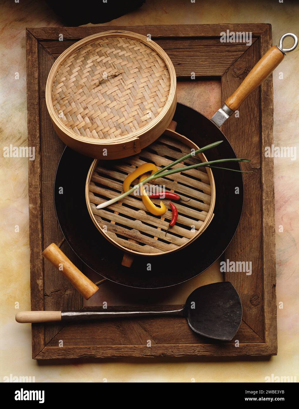 Chili Peppers in Bamboo Steamer Studio Photography Setup Stock Photo