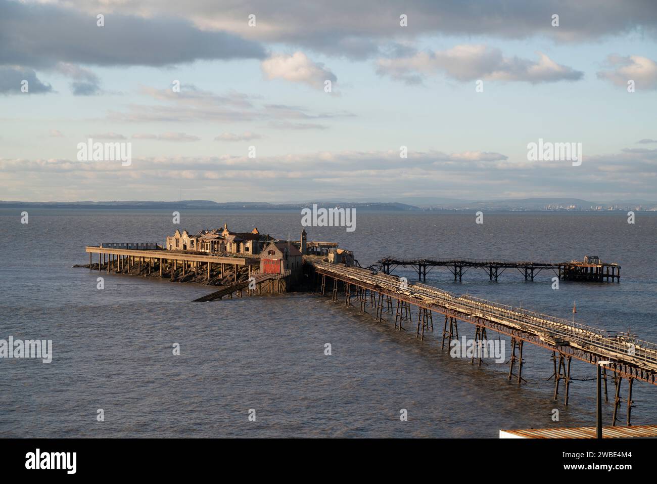 General view of Birnbeck Pier, located in the Bristol Channel at the north end of the Weston-super-Mare, North Somerset. The derelict pier joins the m Stock Photo