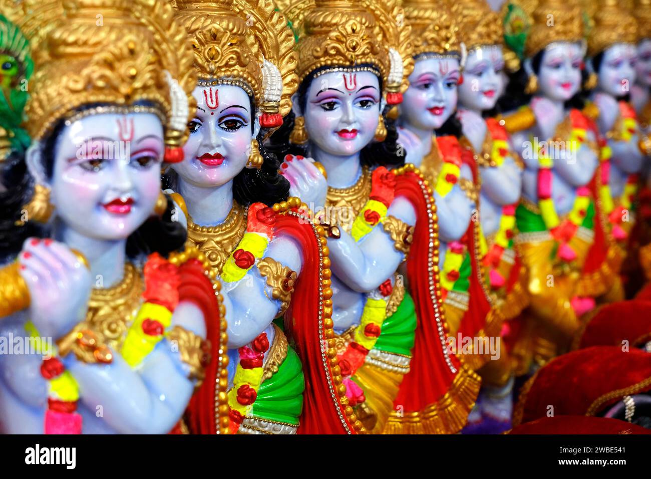The Hindu God, Lord Krishna Idol for sale in Market in Pune, Maharashtra, India. Stock Photo