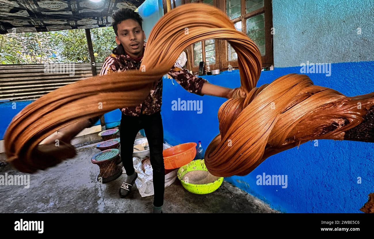 Kathmandu, Bagmati, Nepal. 10th Jan, 2024. A man whips the hardboiled
