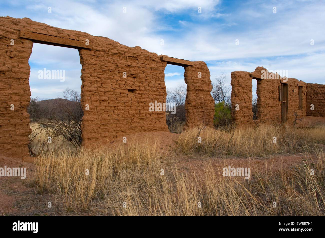 The crumbling adobe walls of the old hospital survive in Gleeson, Arizona Stock Photo