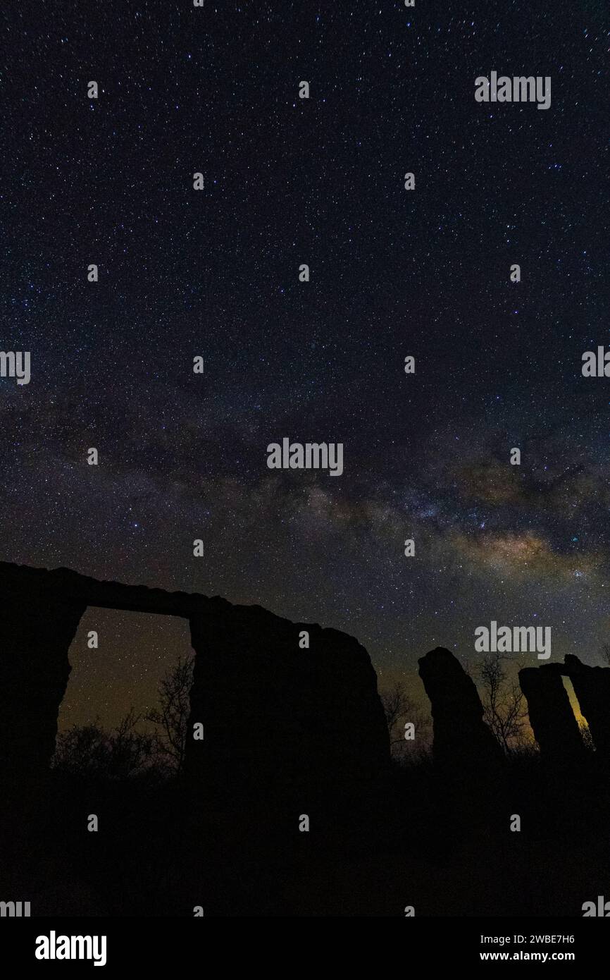 Milky Way rises over crumbling adobe walls in Gleeson, Arizona Stock Photo