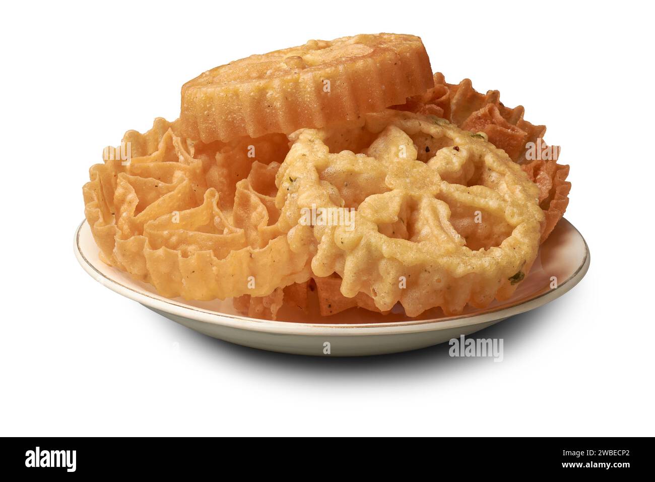 kokis, plate of crispy and deep fried sri lankan food, traditional and popular dessert made from batter of rice flour and coconut milk, festive season Stock Photo