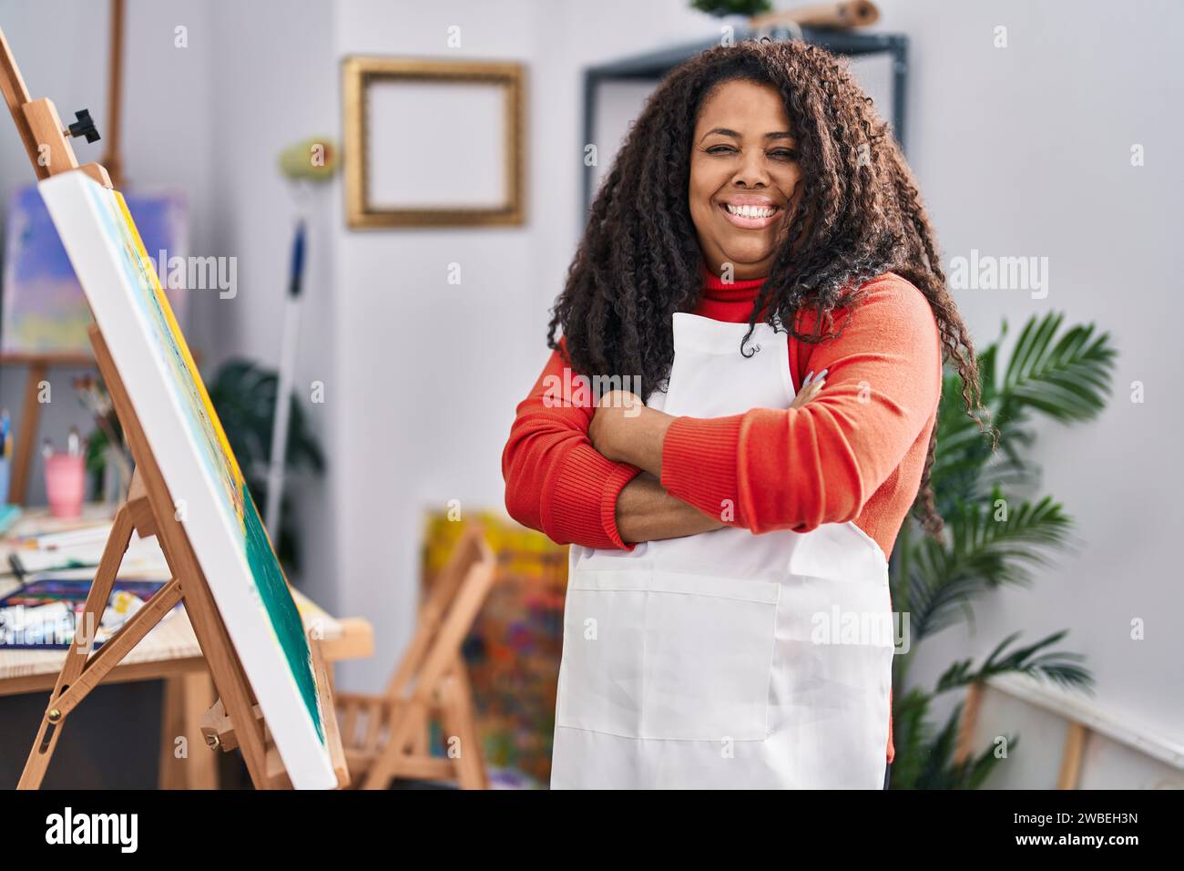 African american woman artist smiling confident standing with arms ...