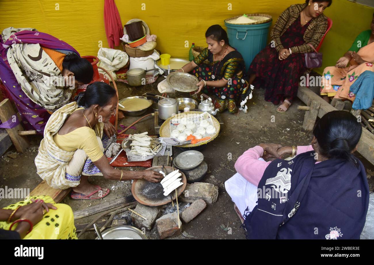 Guwahati, Guwahati, India. 10th Jan, 2024. Assamese women making pitha