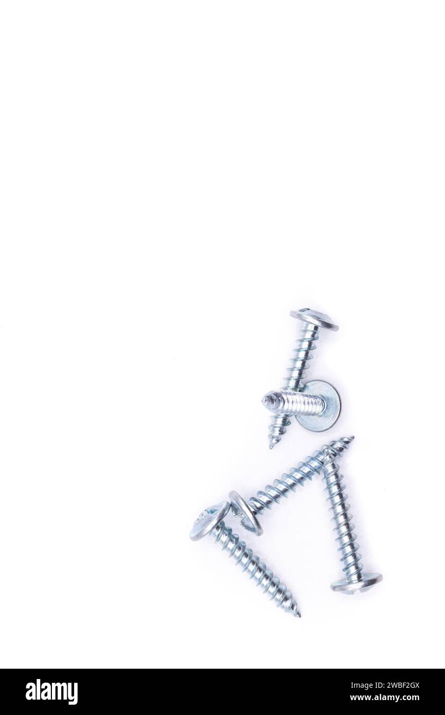 Various screws isolated on white background. Image of screws on isolated background. Concept of isolated screws Stock Photo