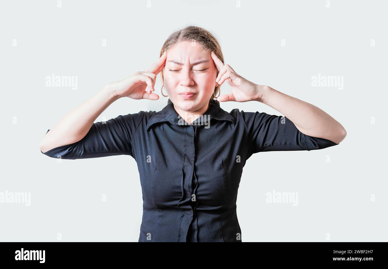 People suffering from migraine on isolated background. Headache concept. Young woman with headache isolated Stock Photo