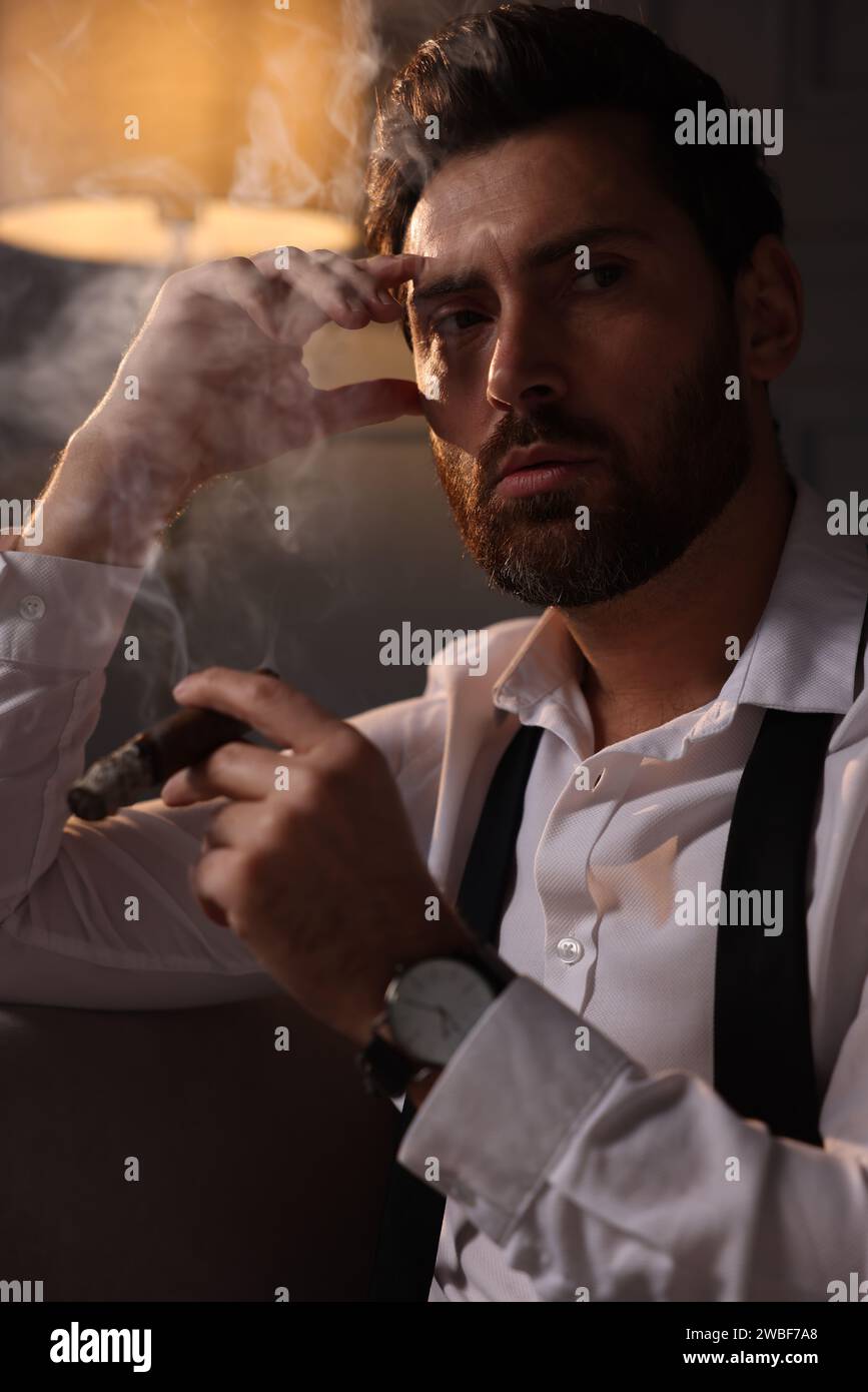 Portrait man smoking in room hi-res stock photography and images - Alamy