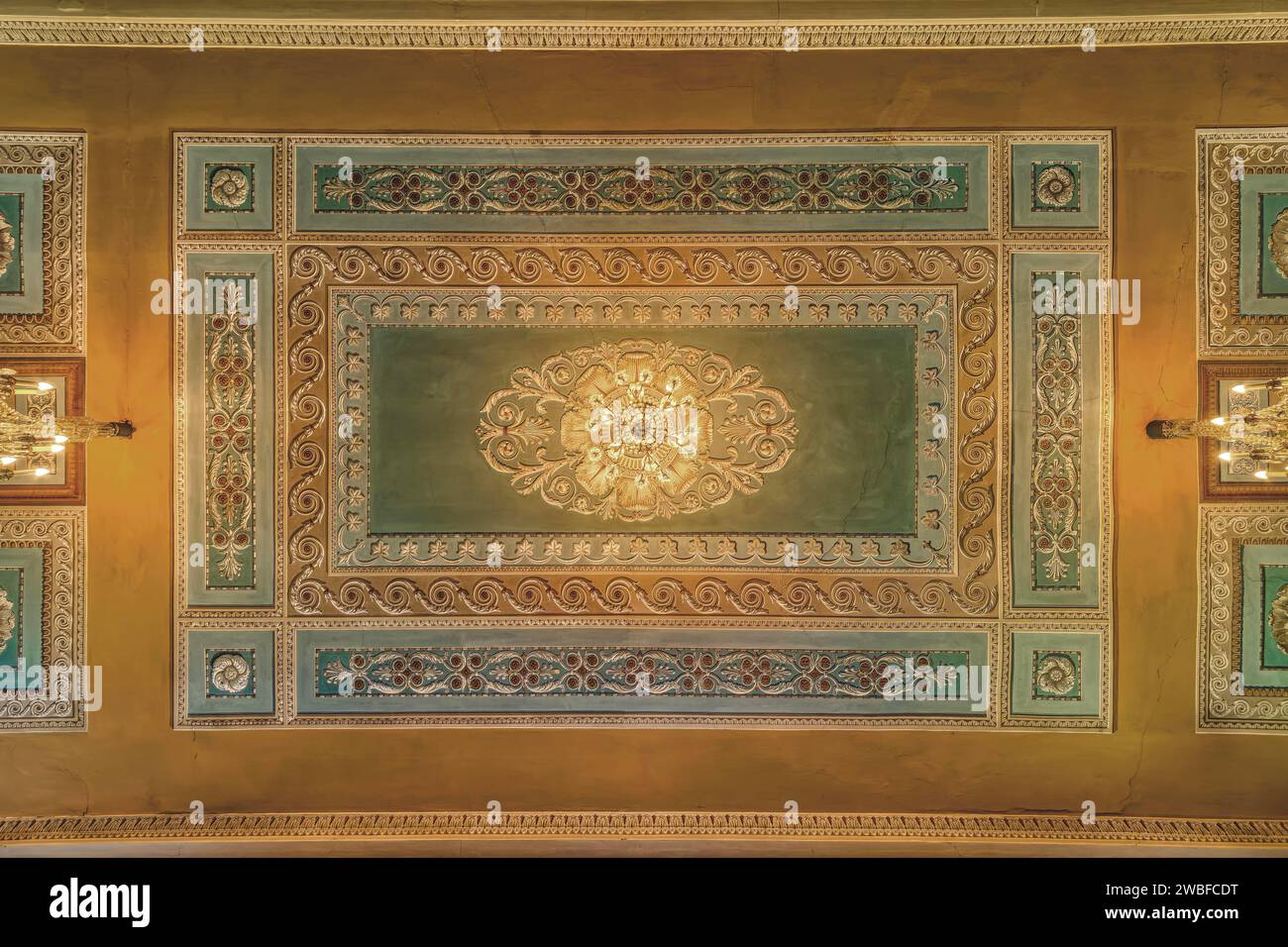 Decorative ceiling with a distinctive chandelier and golden decorations, Schachtrupp Villa, Lost Place, Osterode am Harz, Lower Saxony, Germany Stock Photo