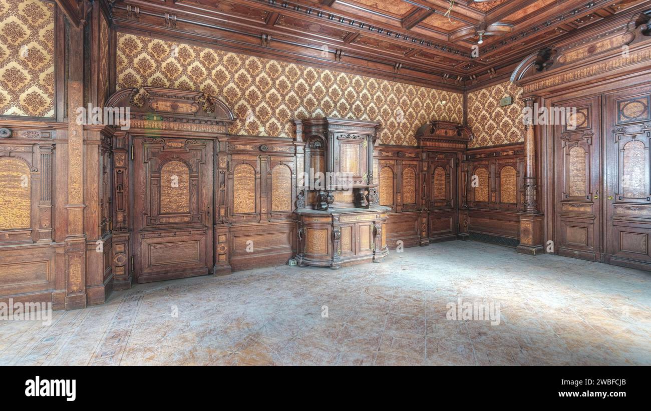 Picture of Elegant, high-ceilinged room with detailed wood panelling and ...
