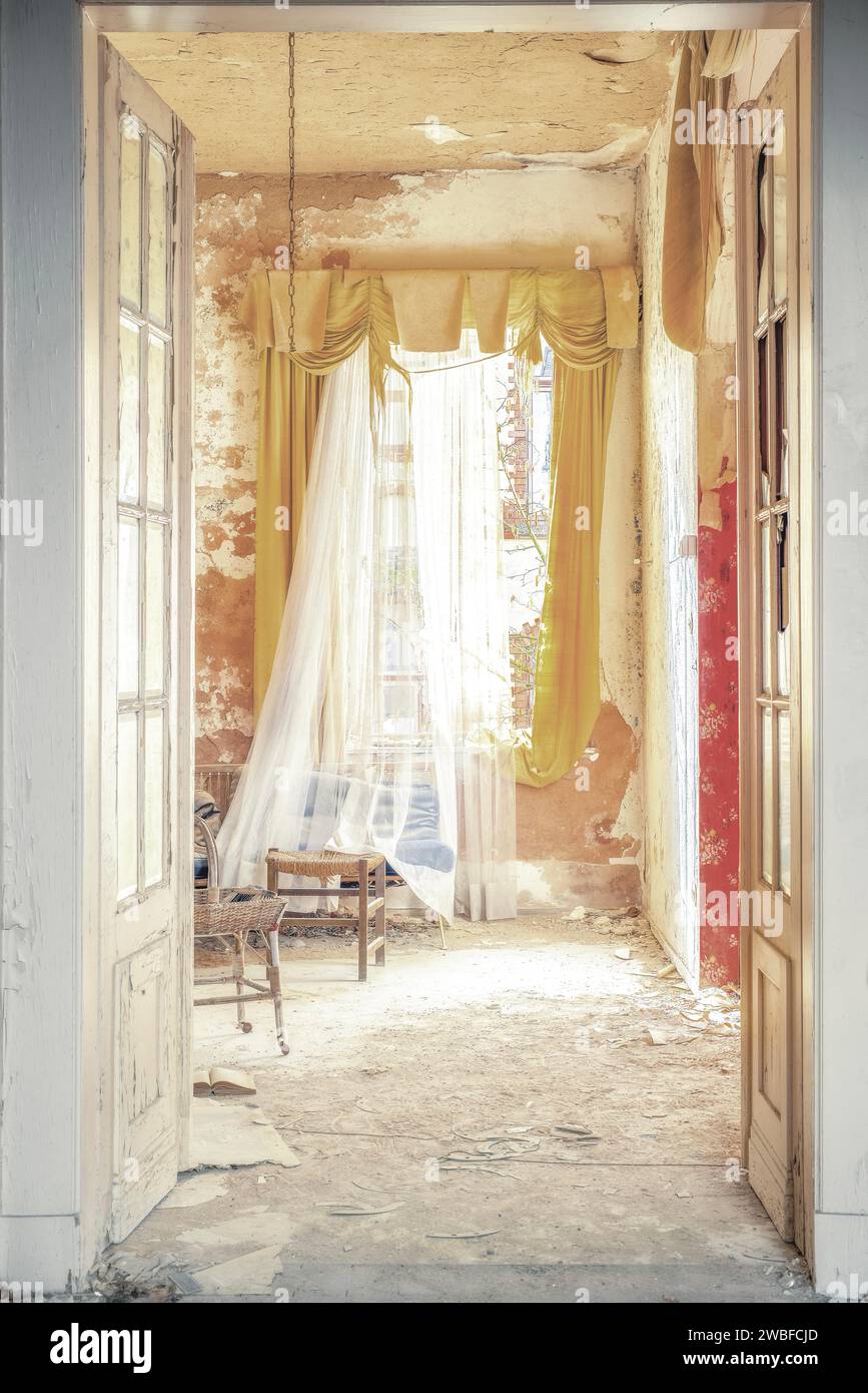 View through an open door to an empty room with torn curtains and dilapidated walls, urologist