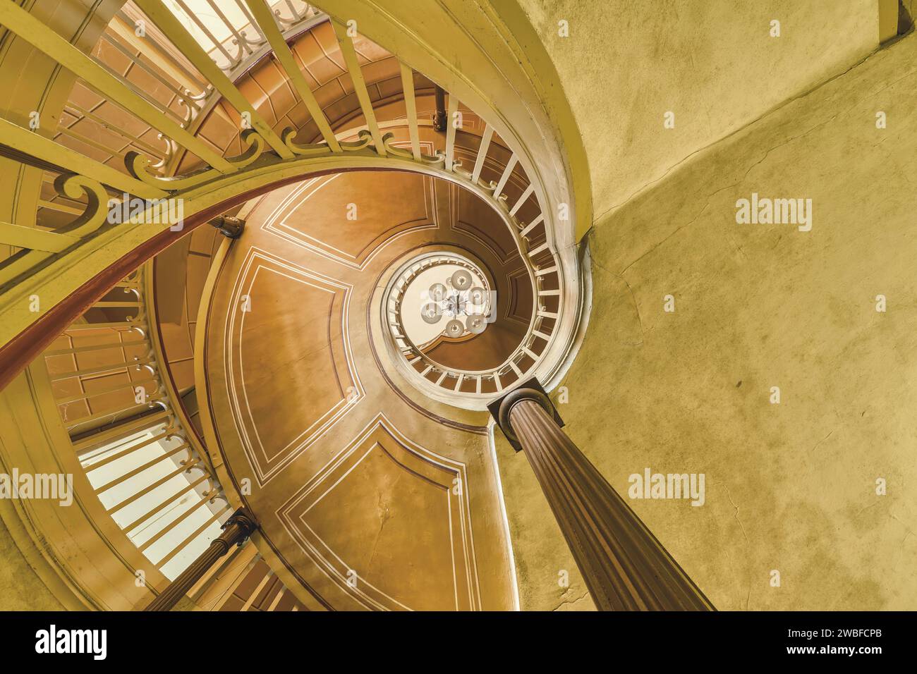 Impressive perspective of a spiral staircase with an oval course and lighting at the top, Schachtrupp Villa, Lost Place, Osterode am Harz, Lower Stock Photo
