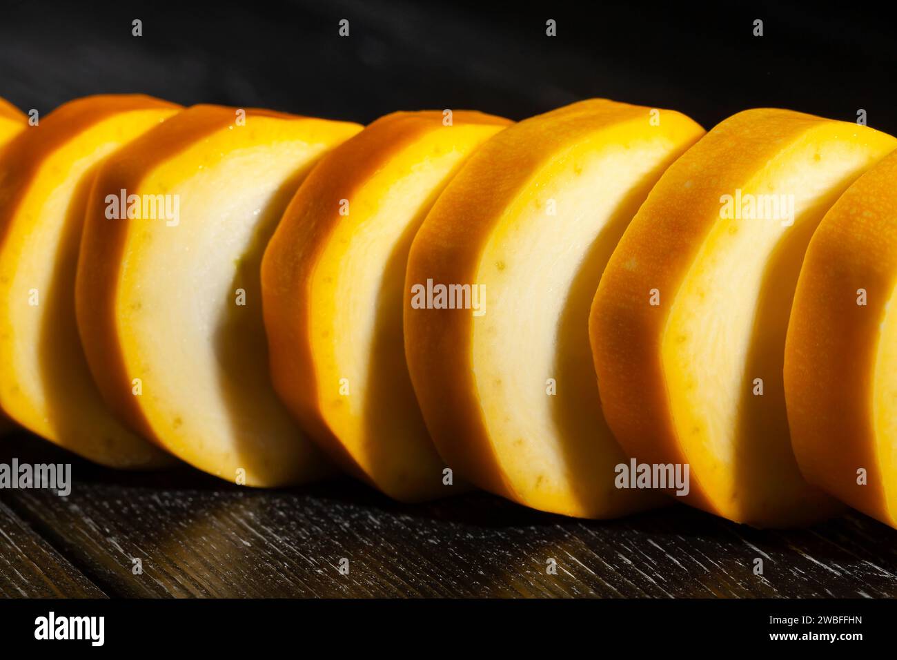 sliced yellow marrow on wood background Stock Photo