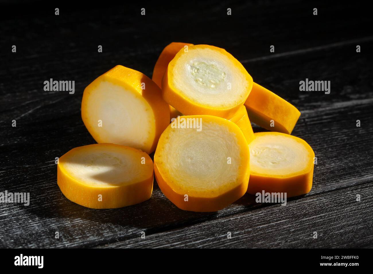 sliced yellow marrow on wood background Stock Photo
