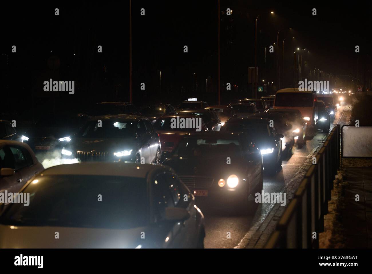 Air Pollution In Warsaw. Cars sit in traffic jam in Warsaw, Poland on